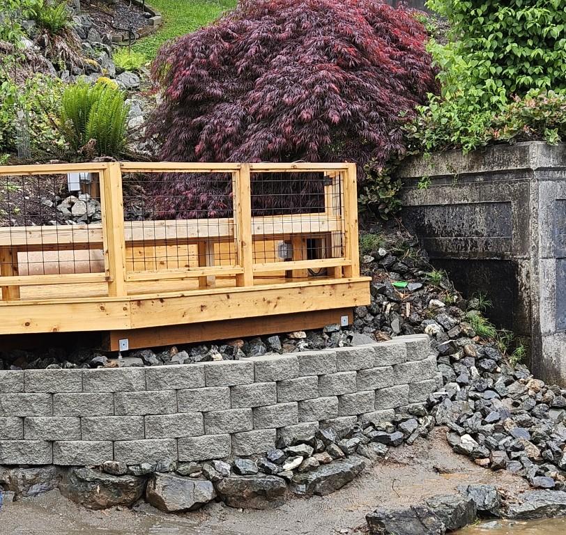 Photo /src/assets/images/gallery-images/Samish Deck_rock wall finished_June 24.jpg